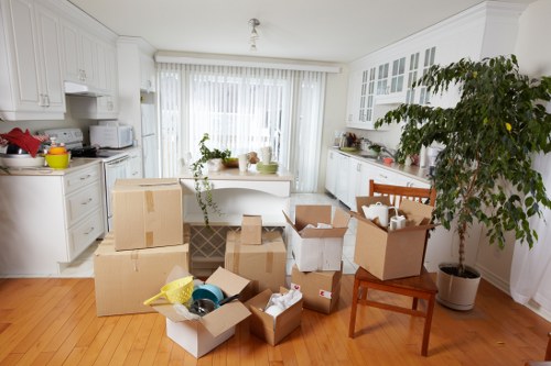 Prepared boxes and furniture ready for a house move in Sunbury
