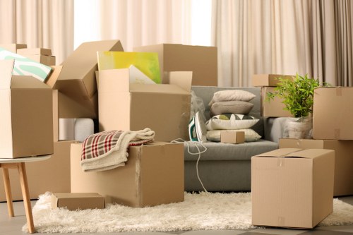 Packed household boxes ready for collection by a Sunbury removal company