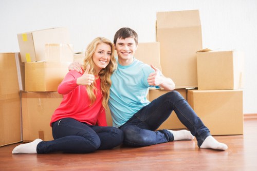 Team loading household items into a moving truck