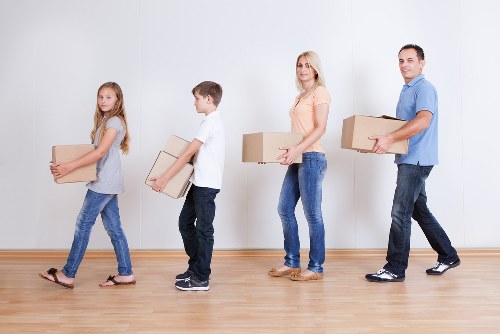 Organised relocation day with boxes and furniture at a new property