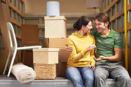 Packed office boxes and furniture prepared for relocation in Sunbury